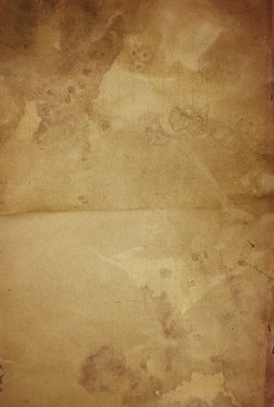 Textured old paper with stains