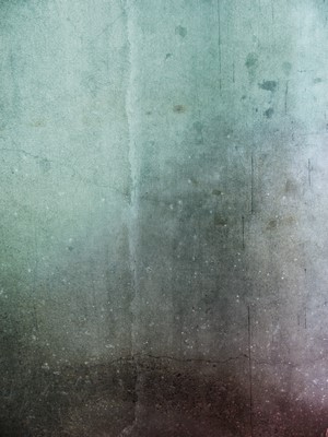 Textured concrete wall with cracks and stains