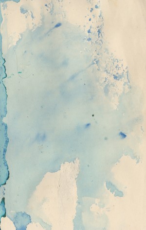 Abstract blue watercolor stains on paper