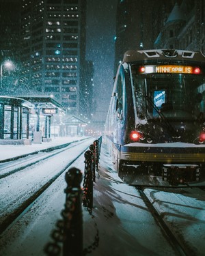 Minneapolis tram in a snowstorm at night
