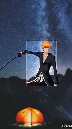 Kurosaki Ichigo from Bleach with sword in front of starry sky