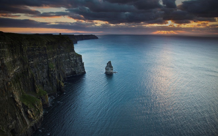 Cliffs of Moher at sunset with sea stack