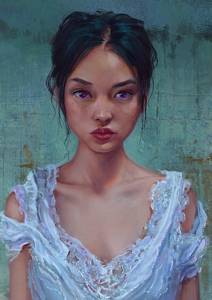 Portrait of a young woman with dark hair and freckles
