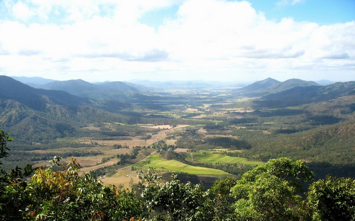 Panoramic view of a wide valley with rolling hills