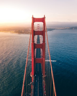 Golden Gate Bridge Over Water at Sunset
