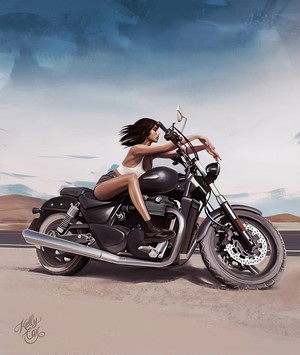 Woman on a motorcycle in a desert landscape