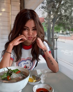 Artwork of a woman with long hair eating pho