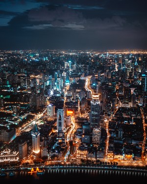 Aerial view of a city skyline at night