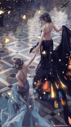 Two women in elegant dresses dancing