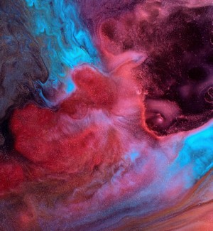Abstract colorful fluid art with red and blue swirls