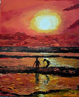 Children playing at sunset on the beach