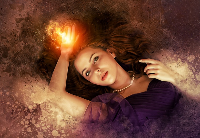 Beautiful woman with magic fire