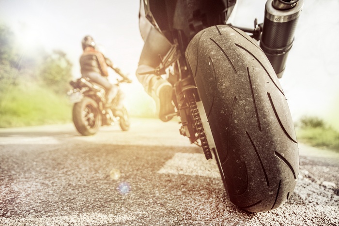 Motorcycles on a sunny road