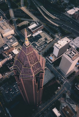 Aerial view of a skyscraper and city streets