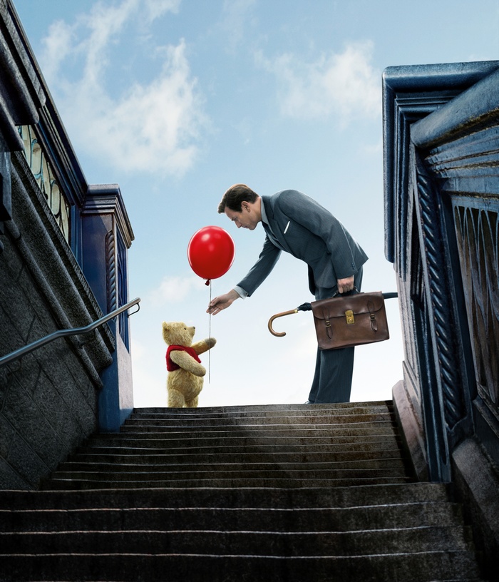 Christopher Robin and Winnie the Pooh with a balloon