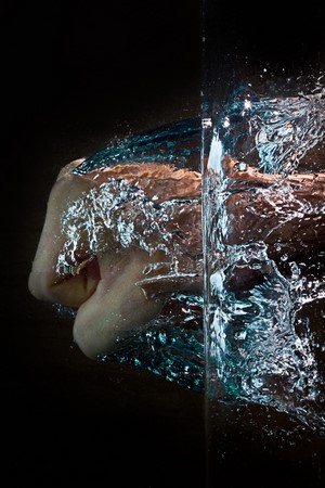 Fist punching through water