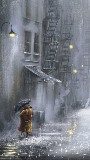 Couple under umbrella in rainy city street
