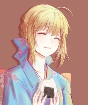 Saber from Fate/Stay Night eating onigiri