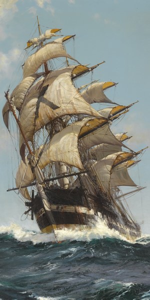 Tall ship sailing through rough seas