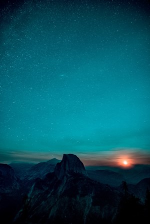 Half Dome at Yosemite National Park under a starry sky