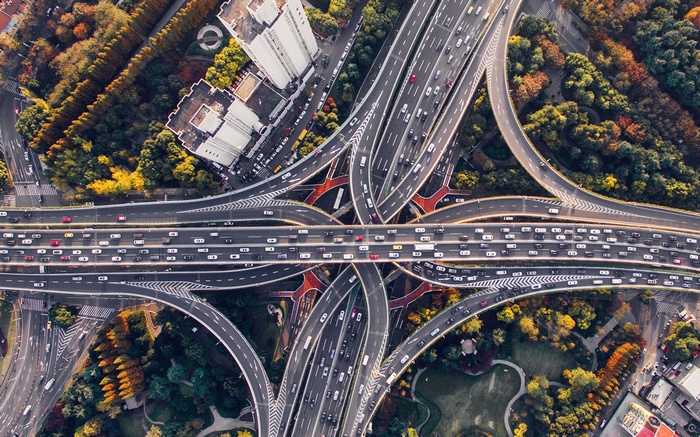 Aerial view of a complex highway interchange with traffic