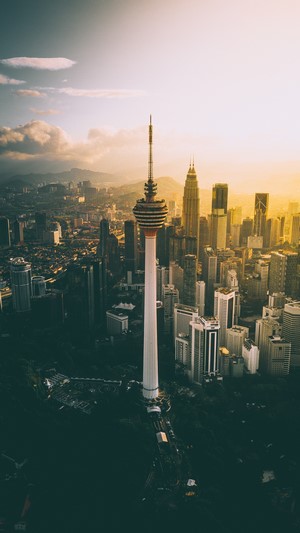 Aerial view of Kuala Lumpur cityscape with Menara KL tower