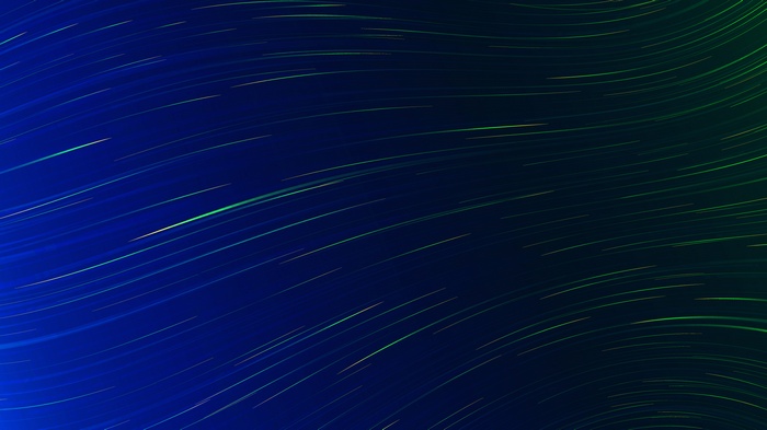 Blue and green light rays on a dark background