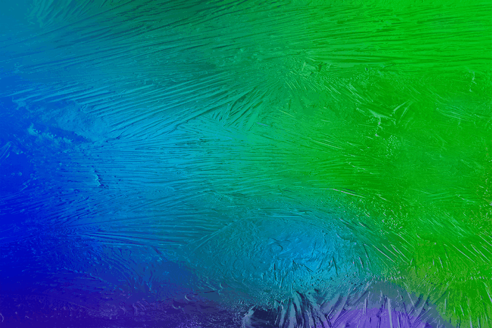 Abstract pattern of blue, teal, and green ice formations
