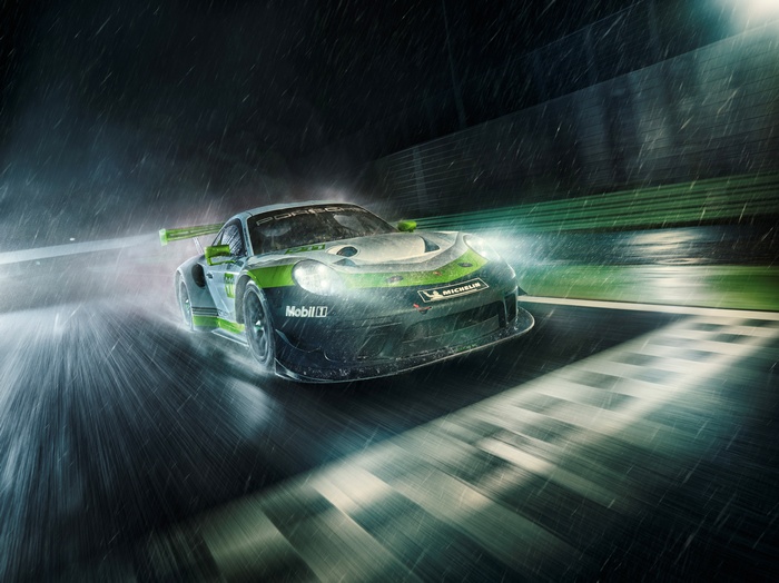 Porsche 911 GT3 R racing in the rain
