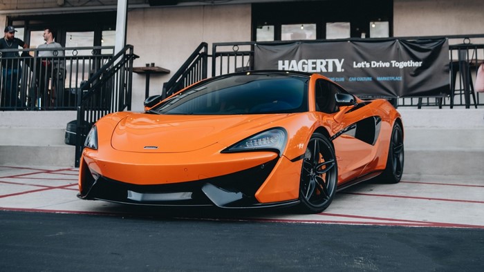 Orange McLaren 600LT parked outside Hagerty