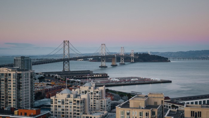 Bay Bridge and San Francisco skyline at dusk