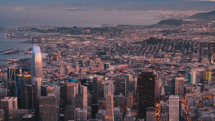 San Francisco cityscape at dusk with bay