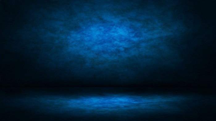 Blue textured background with light effects