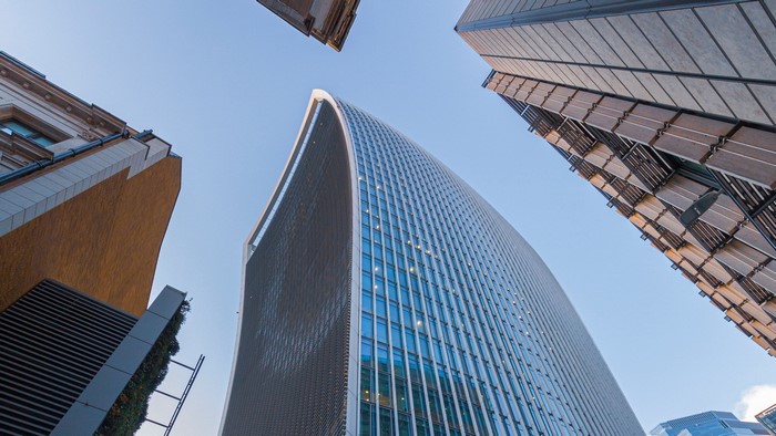 Modern skyscrapers against a clear blue sky