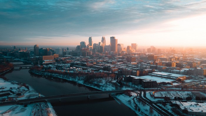 Aerial view of Minneapolis skyline at sunrise in winter