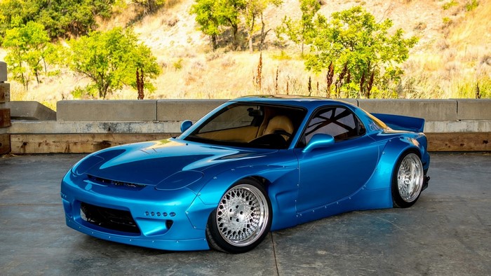 Blue Mazda RX-7 with widebody kit