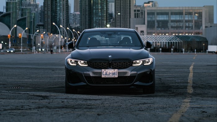 BMW M340i parked in a city lot