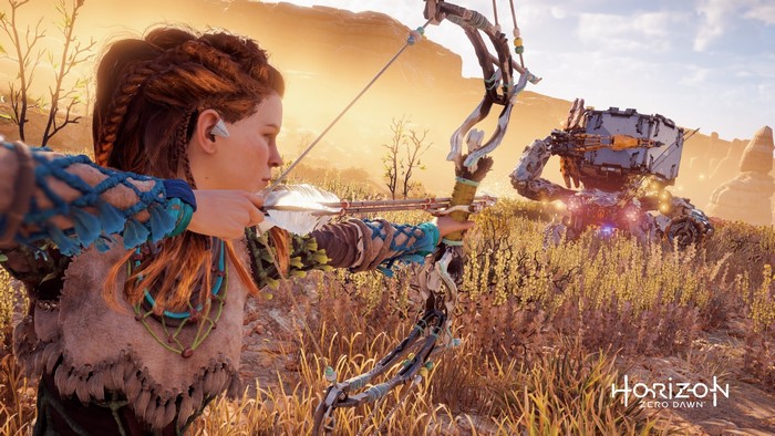 Aloy from Horizon Zero Dawn aiming a bow at a robot