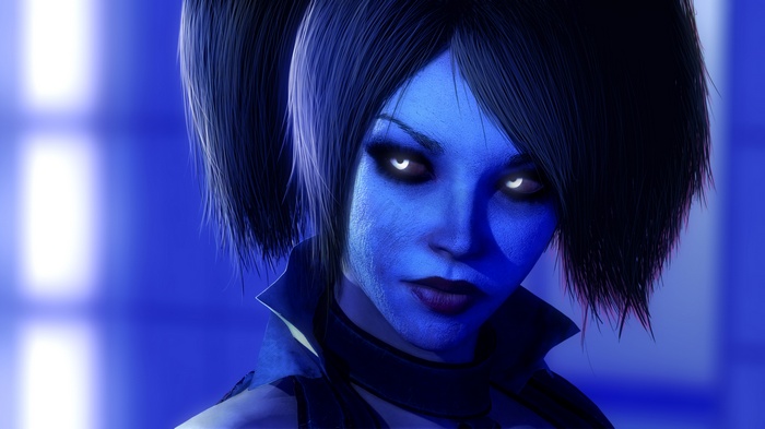 Blue-skinned woman with glowing eyes