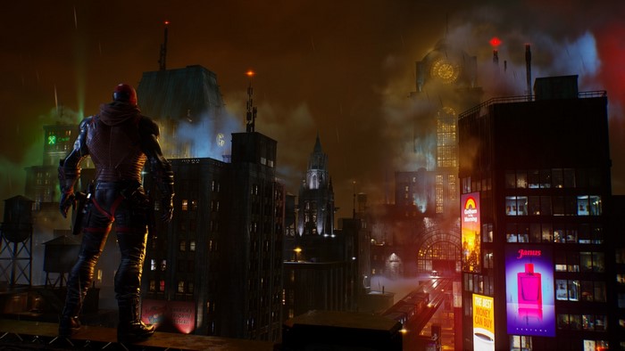 Red Hood from Gotham Knights overlooking a rainy city