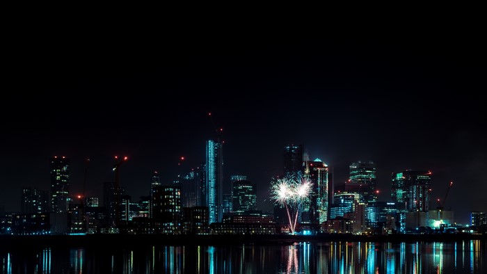 4K Night City Skyline with Fireworks