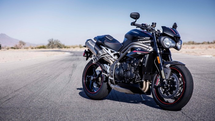 Triumph Speed Triple RS motorcycle on a road