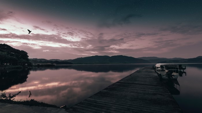 4K Pier with Boat at Dusk