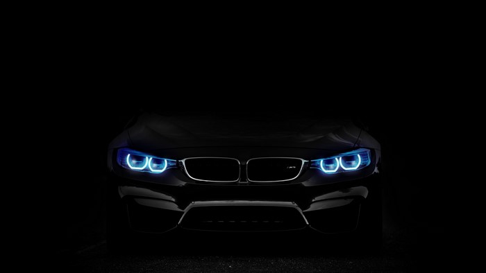 4K BMW M4 Frontal View with Blue Headlights