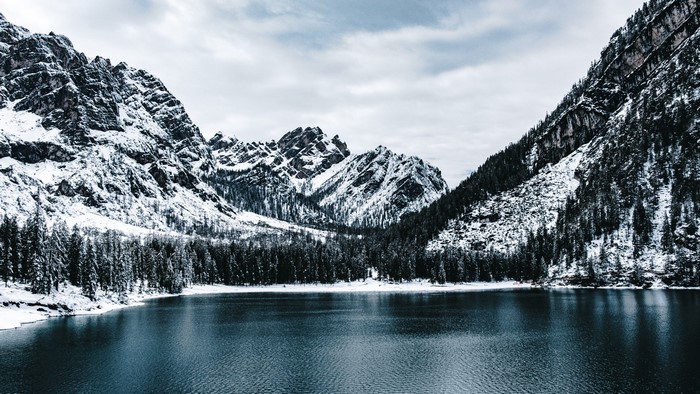 Snow-covered mountains and lake