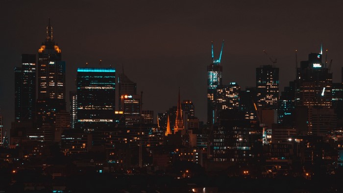 Night cityscape with illuminated skyscrapers