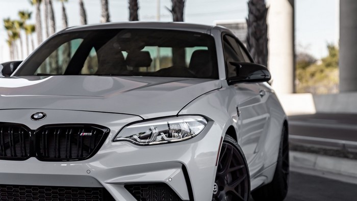 White BMW M2 parked outdoors