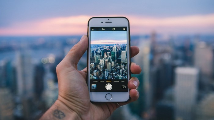 iPhone taking a photo of New York City skyline
