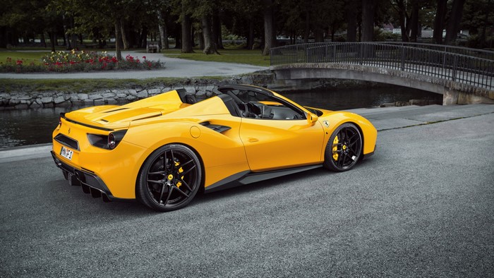 Yellow Ferrari 488 Spider on Asphalt
