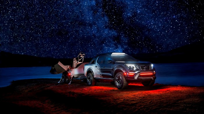 Nissan Navara with trailer under starry sky